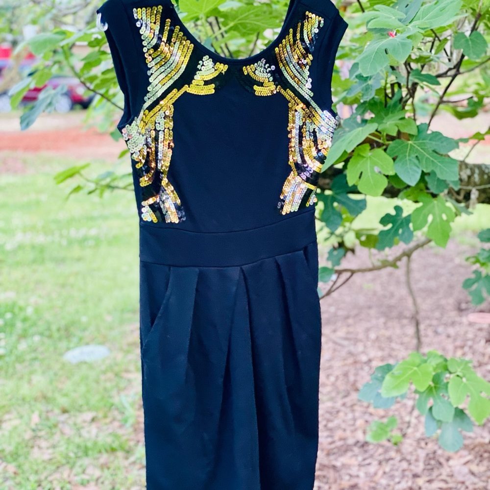 XOXO black minidress with sequin trim.